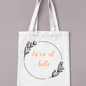 Sac de couleur crème floqué "La vie est belle" avec un cadre de fleurs