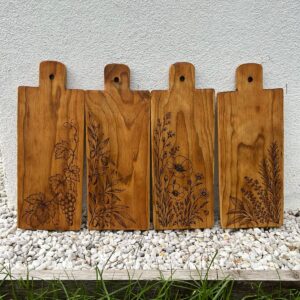 Collection de 4 planches de présentation en bois gravées à motifs végétaux